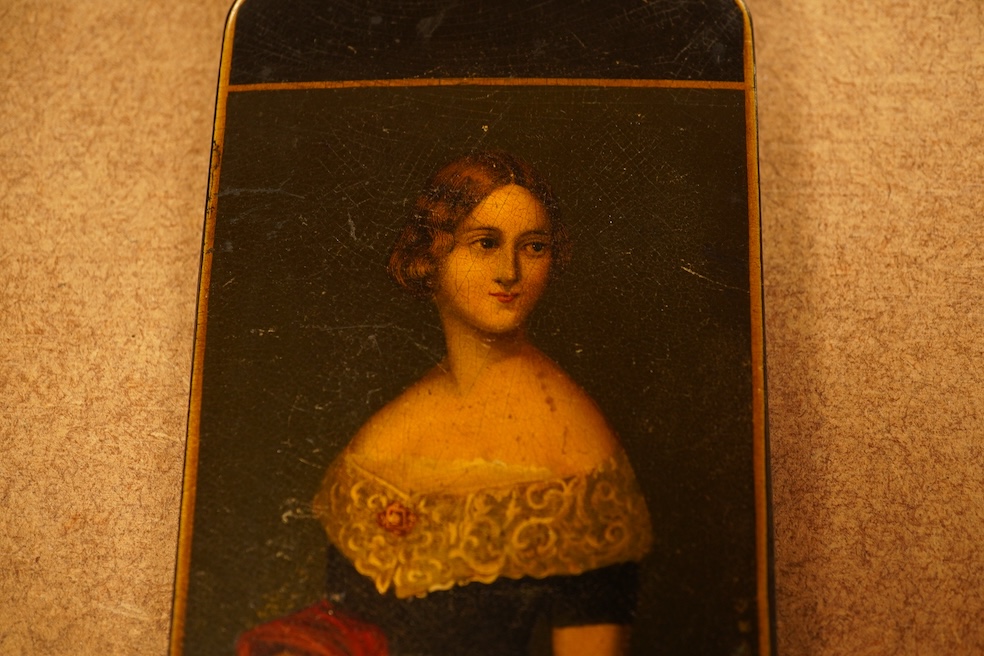 A Victorian papier-mâché cigar envelope with a portrait of Jenny Lind to the cover, 13cm high